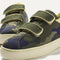 Close up of the vamp of The Kids Strap Sneaker in Spruce Camo. 