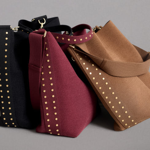 Collection shot of the studded bucket bags.