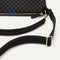 The Mini Zip Bucket in Black Sand lying flat, shown at a diagonal view from the left.