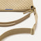 The Mini Zip Bucket in Knot Brown lying flat, shown at a diagonal view from the left.