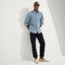 model | Alternate view of a model wearing The Ravello Loafer in Sand. 