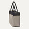 The Classic Tote in Black Herringbone, shown from the side.