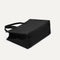 The Classic Tote in Black Sand, shown from the bottom. 