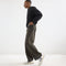 model | Alternate view of a model wearing The Men's Court Sneaker in Black Drift.