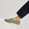 hover | Model wearing The Daily Driver in Sprout. 