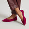 hover | Model wearing The Point III in ReVelvet Mulberry. 