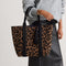 hover | Model holding The Revelvet Lightweight Tote in Revlvet Cat.