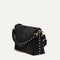 The Daily Crossbody in Revelvet™ Black shown at a diagonal view from the left.