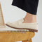 hover | Model wearing The Penny Loafer in Conch Raffia-Knit.