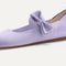 Close up of the bow detail of The Kids Tux Bow Mary Jane in Soft Orchid.