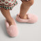 hover | Model wearing The Teddy Kids Slipper in Sugar Cookie.