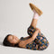 model | Alternate view of a child wearing The Teddy Kids Slipper in Wren.