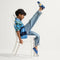 model | Alternate view of a child wearing The Kids Clog in Indigo Daisy. 