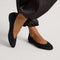 hover | Model wearing The Almond Ballet in Black. 