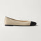 side | The Almond Ballet in Conch Captoe shown from the side. 