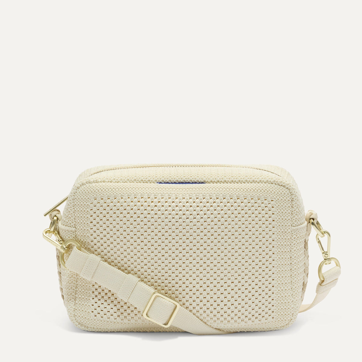 PDP |The Crossbody Camera Bag in  Cream Twist Open-Knit, shown from the front. 