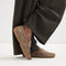 hover | Model wearing The Men's Driver in Brown Camo. 