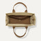 The Classic Tote in Macadamia Open-Knit, shown from above, with the interior exposed.