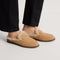 hover | Model wearing The Après Loafer Mule in ReVelvet Pecan.