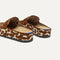 Close up of the heel of The Penny Clog in ReVelvet™ Rodeo Torte, with Rothy's signature blue halo. 