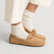 hover | Model wearing The Driver Moc in ReVelvet Pecan.