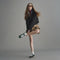 model | Alternate view of a model wearing The Ivy Sneaker in ReVelvet Evergreen. 