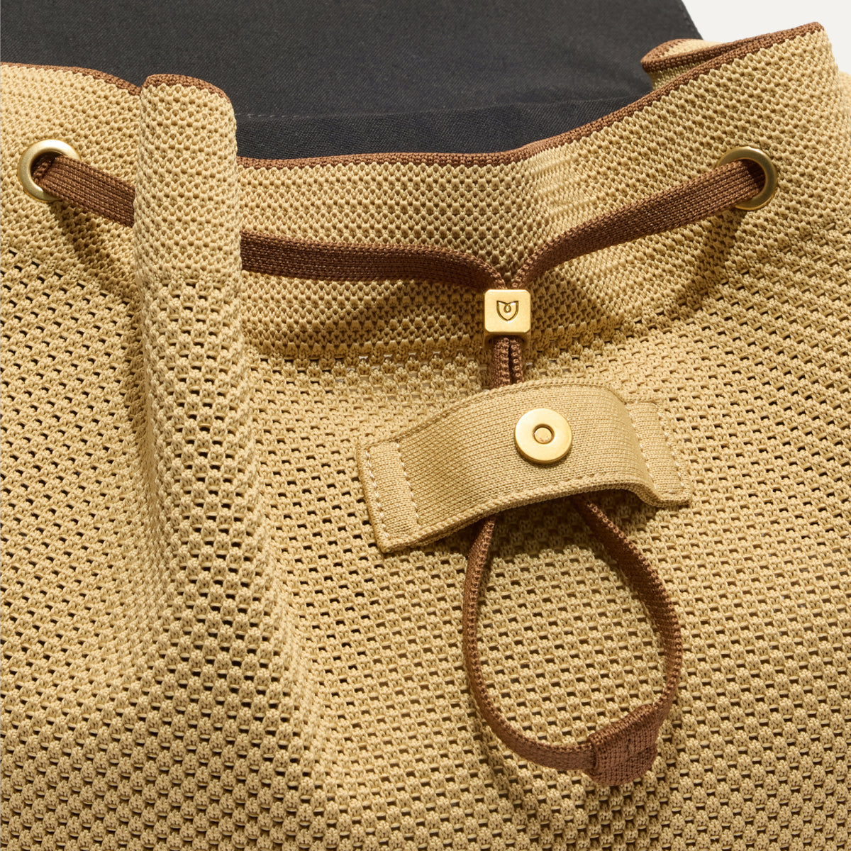 Close up of the drawstring closure on The Cinch Backpack.