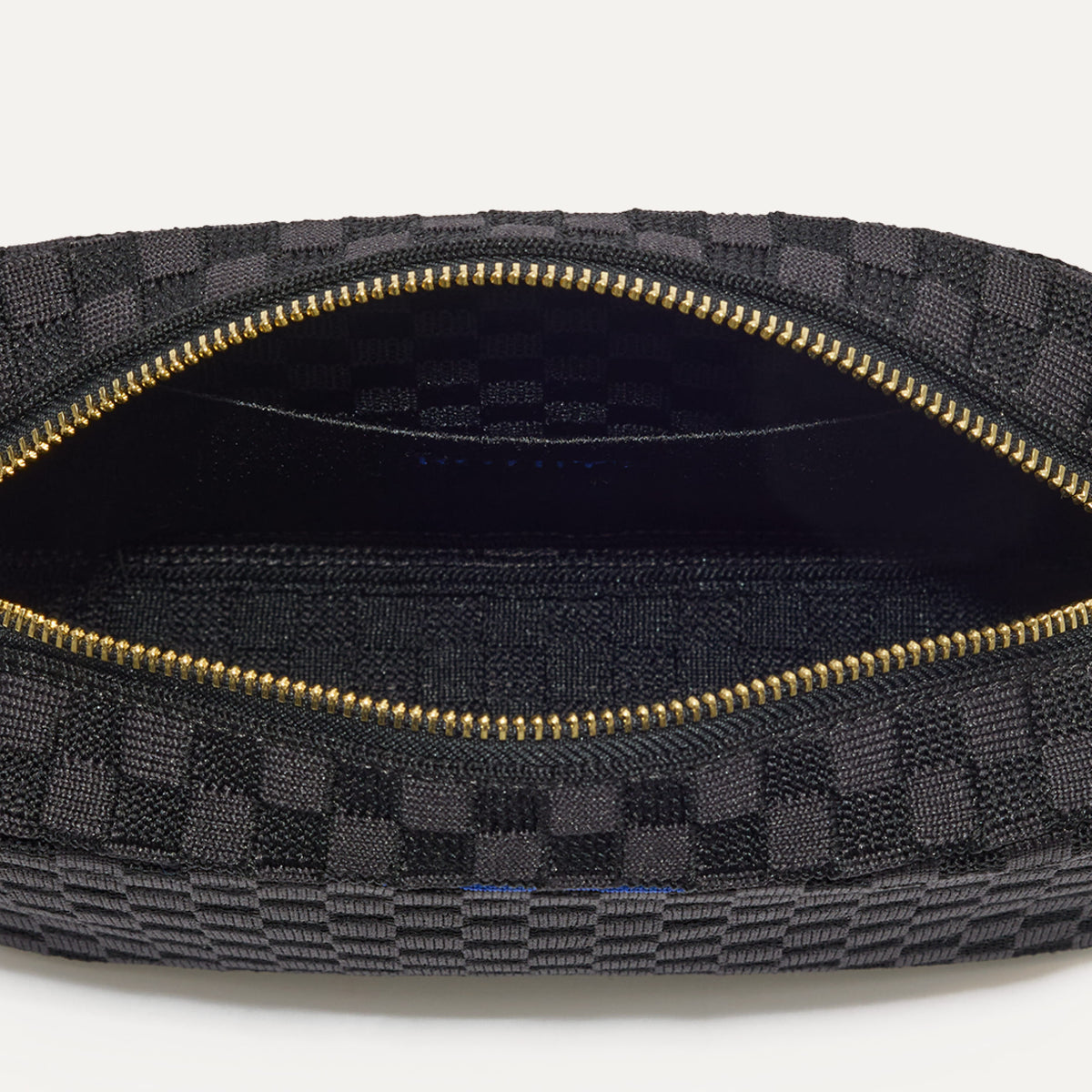 Interior close up of The Crossbody Camera Bag in Black Sand.